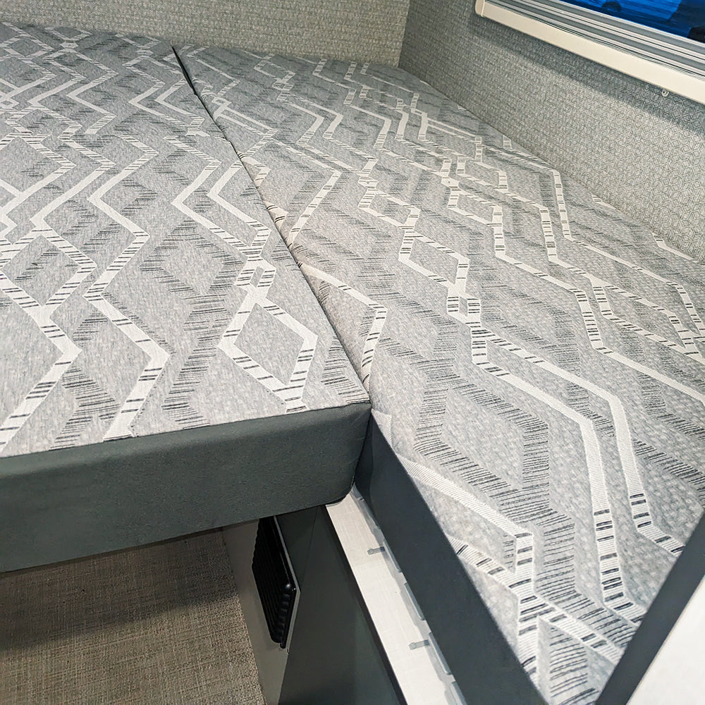 Lifestyle view of the EKKO replacement mattress driver side and the center opened flat