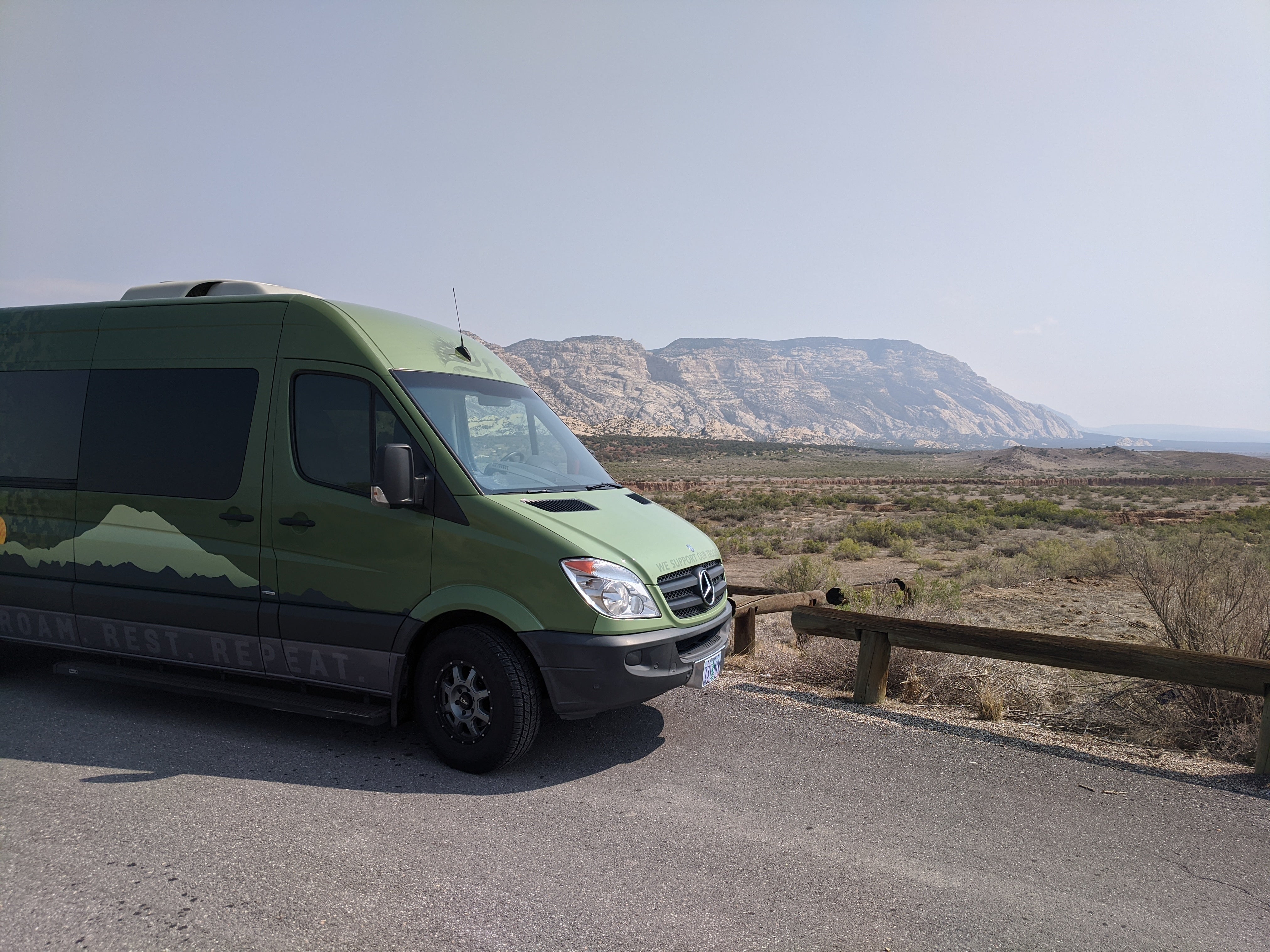 camo van on the road