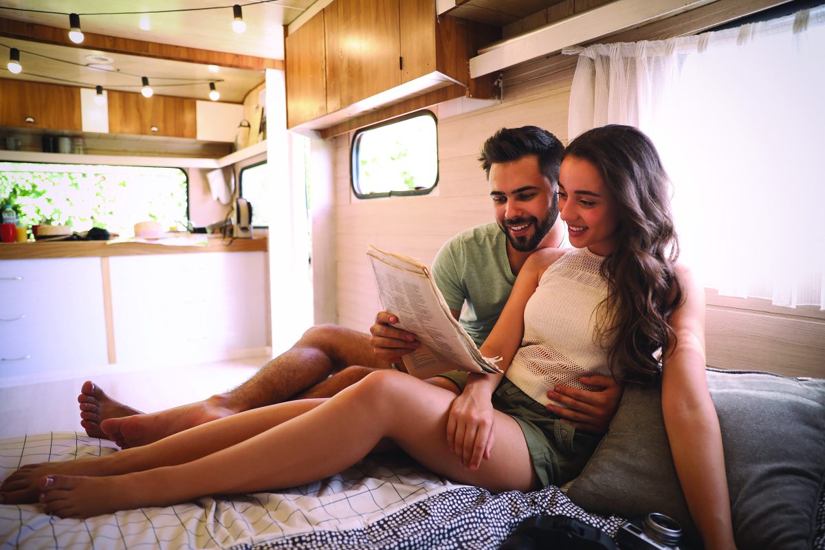 couple relaxing in RV