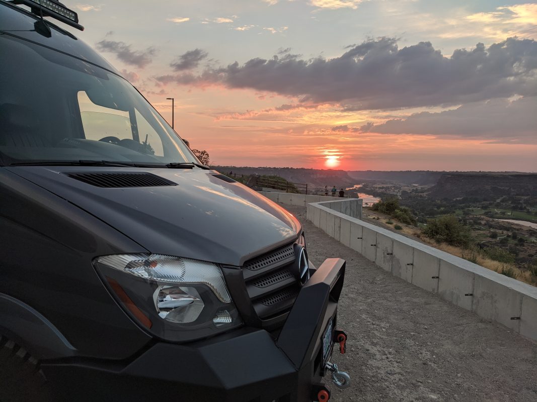 gray van at sunset